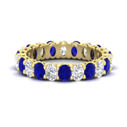 3-carat-oval-diamond-full-eternity-band-with-blue-saphhire-in-yellow-gold-fdewb8324ovgsablsleep-4.00x3.00mm-nl-yg